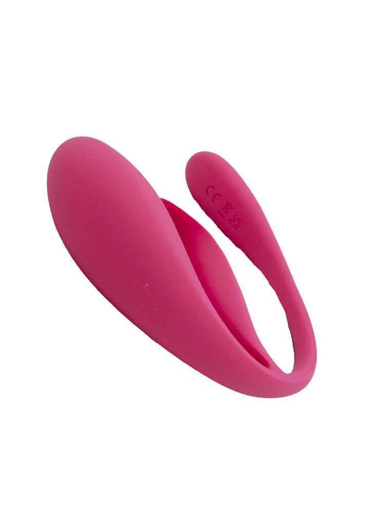 Vibratore vaginale e clitorideo di colore rosa con telecomando wireless